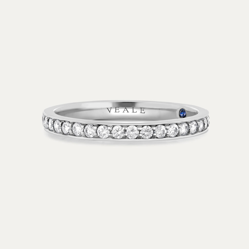 pavé set half eternity wedding band
