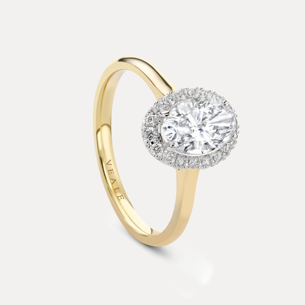 Oval-cut halo diamond engagement ring | Veale Fine Jewellery