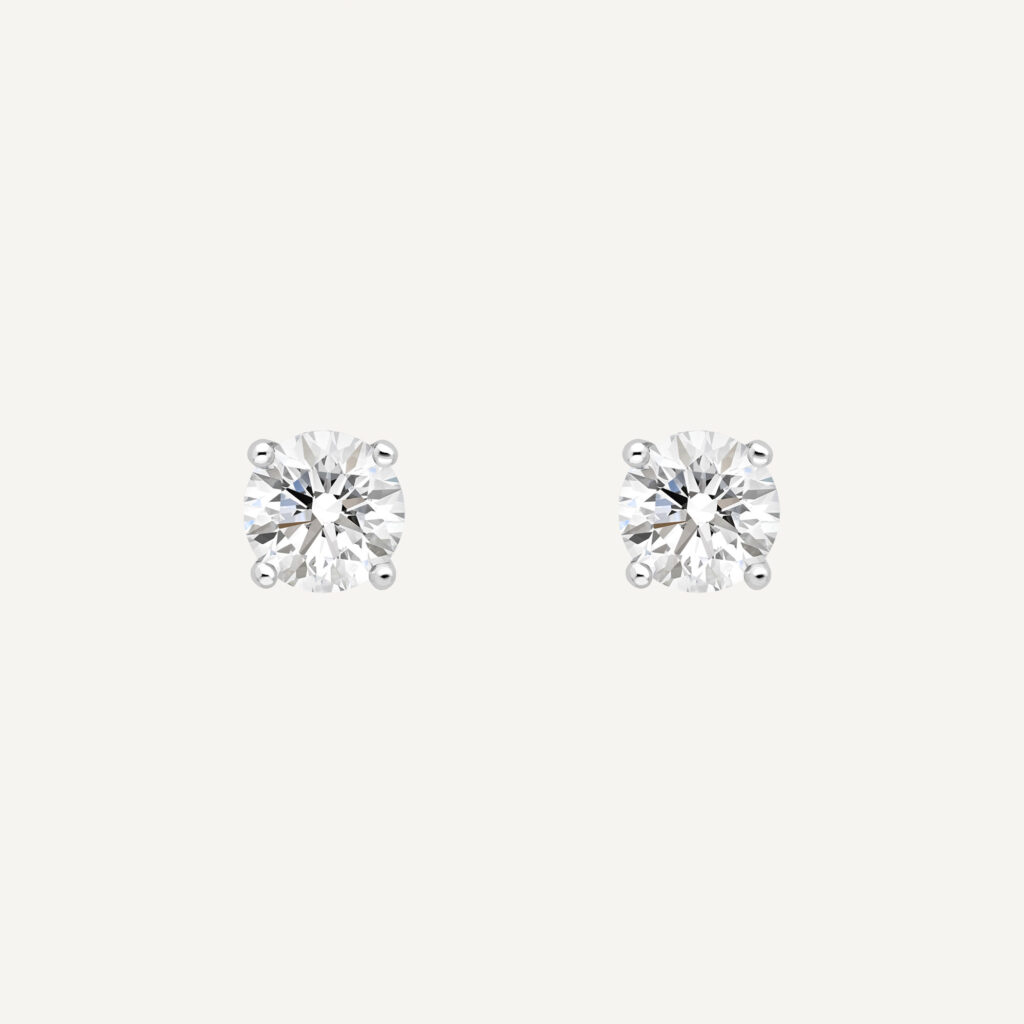 sleek stud diamond earrings in a fine 4 claw platinum setting