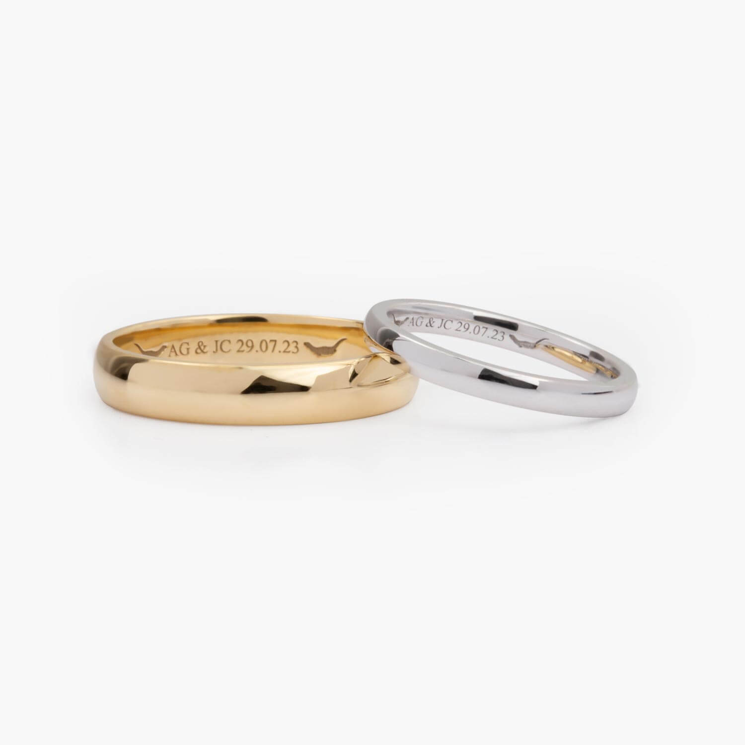 Laser engraved gold and platinum wedding rings