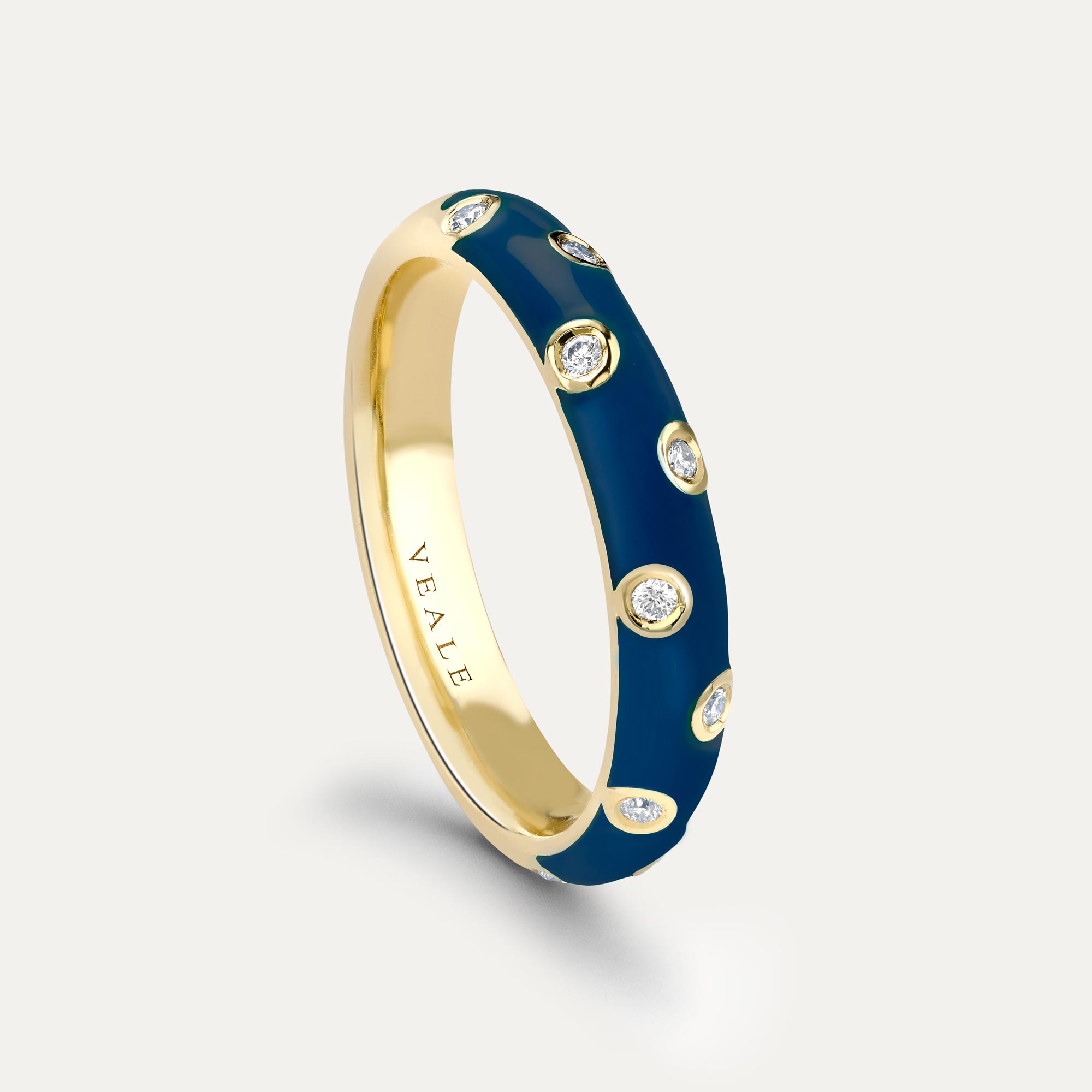 Gold stacking ring with blue enamel as an example of our favourite gold jewellery