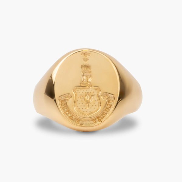 Bespoke signet ring with family crest engraving.