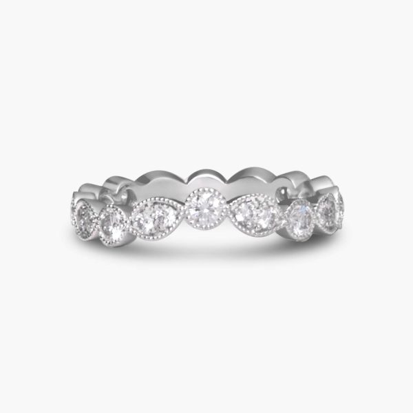 Shaped full eternity ring set with a diamonds in a bezel setting and a marquise shaped setting with a vintage milgrain edge | Veale Fine Jewellery Hertfordshire