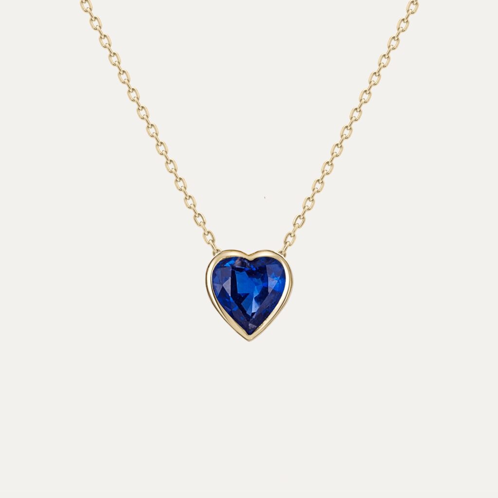 heart shaped sapphire in yellow gold on a delicated gold chain | Veale Fine Jewellery