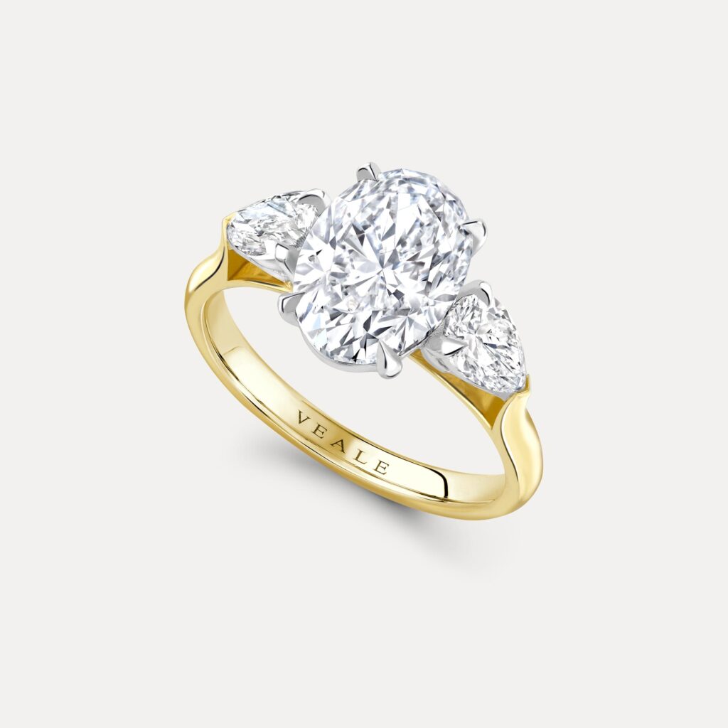 Bespoke Oval & Pear Cut Diamond Trilogy Engagement ring