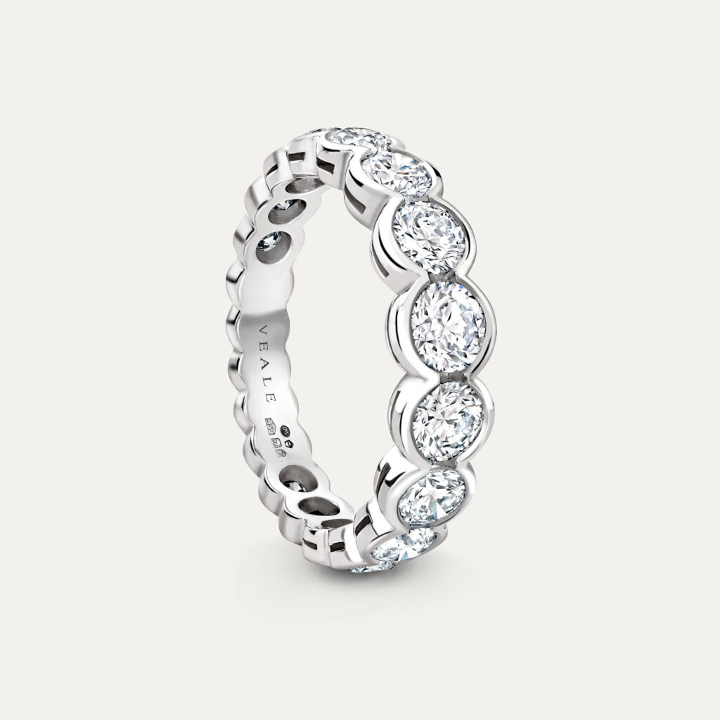 Side profile of platinum scalloped eternity ring