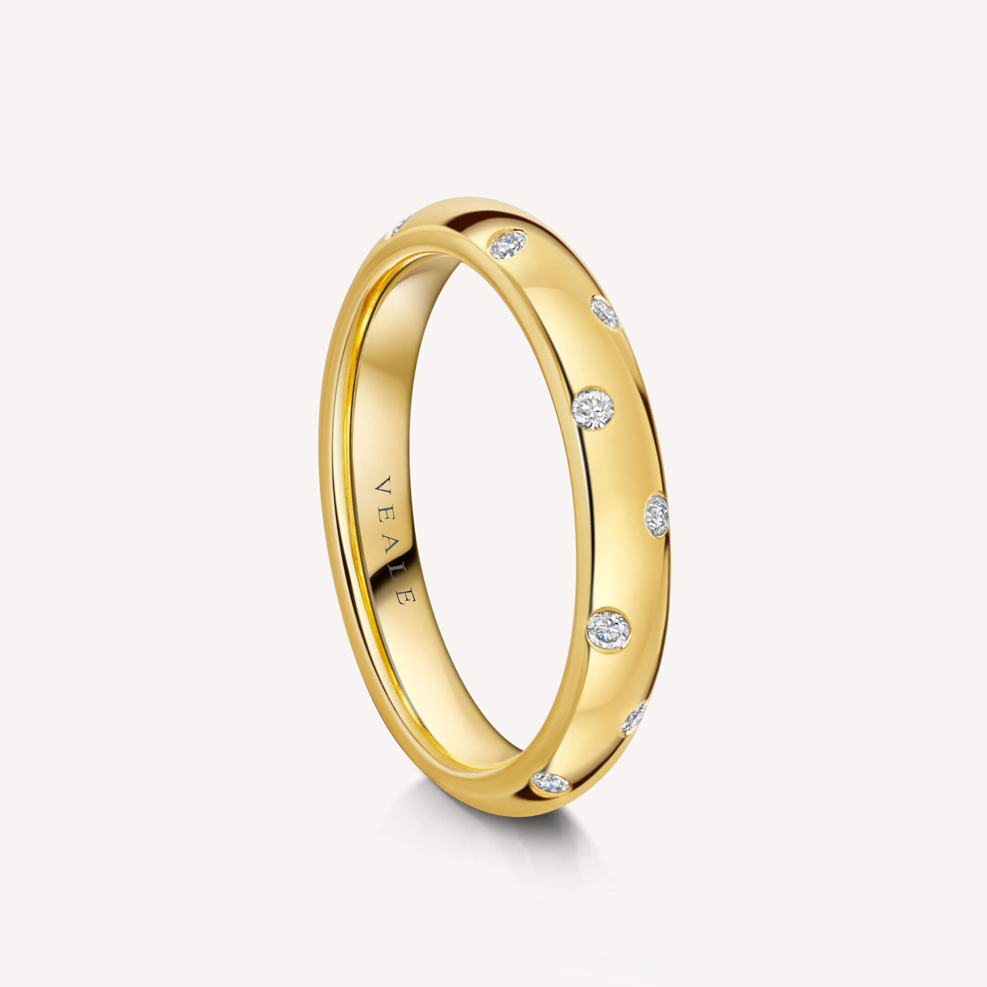 Gold stacking ring with small diamonds