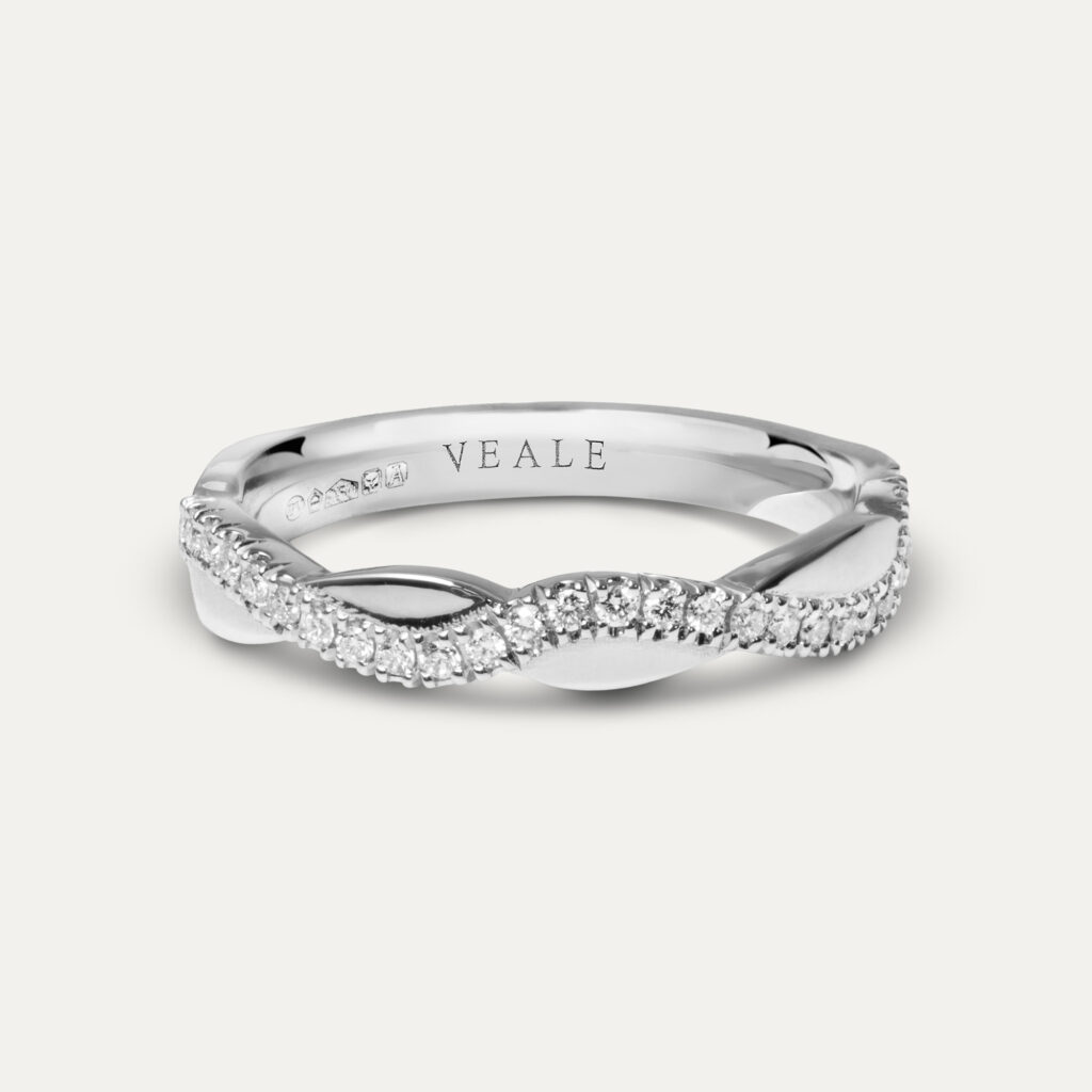 Infinity Wedding Ring with Diamond Detail